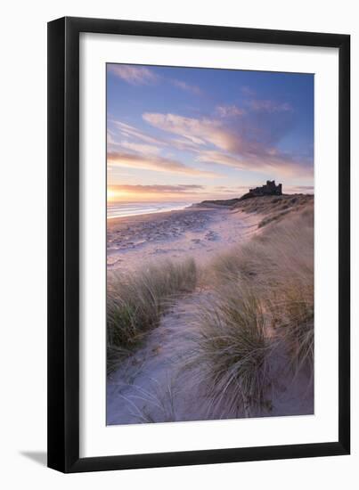 Sunrise over Bamburgh Beach and Castle from the Sand Dunes, Northumberland, England. Spring (March)-Adam Burton-Framed Photographic Print