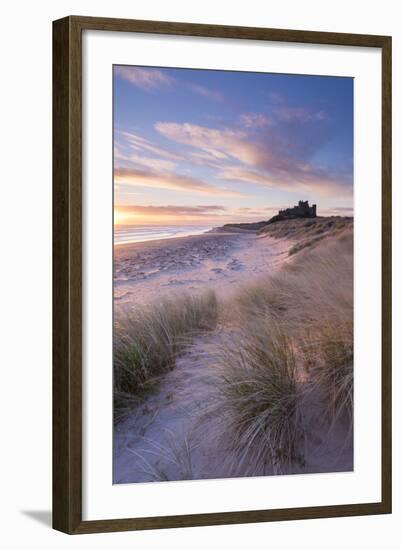 Sunrise over Bamburgh Beach and Castle from the Sand Dunes, Northumberland, England. Spring (March)-Adam Burton-Framed Photographic Print