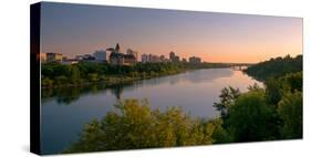 Sunrise over South Saskatchewan River and Saskatoon Skyline, Saskatchewan, Canada-null-Stretched Canvas