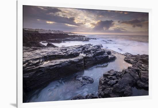 Sunrise over the dramatic rocky coastline of Porthcawl in winter, South Wales-Adam Burton-Framed Photographic Print