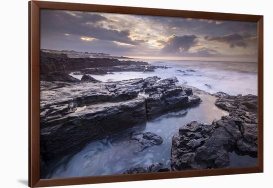 Sunrise over the dramatic rocky coastline of Porthcawl in winter, South Wales-Adam Burton-Framed Photographic Print