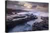 Sunrise over the dramatic rocky coastline of Porthcawl in winter, South Wales-Adam Burton-Stretched Canvas