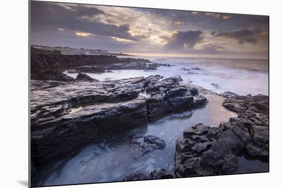 Sunrise over the dramatic rocky coastline of Porthcawl in winter, South Wales-Adam Burton-Mounted Photographic Print