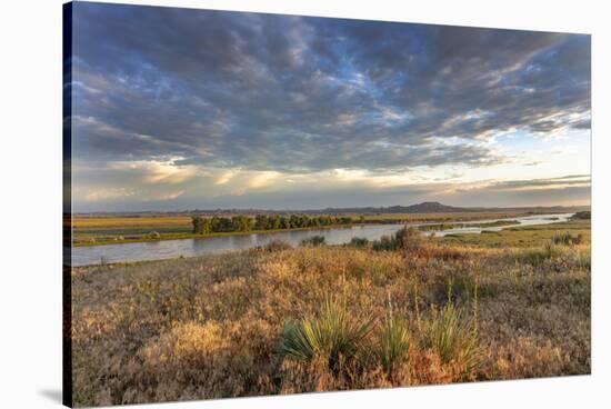 Sunrise over the Yellowstone River near Terry, Montana, USA-Chuck Haney-Stretched Canvas