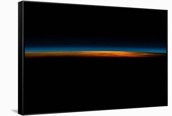 Sunrise sunset over Philippine Sea seen from satellite-null-Framed Stretched Canvas