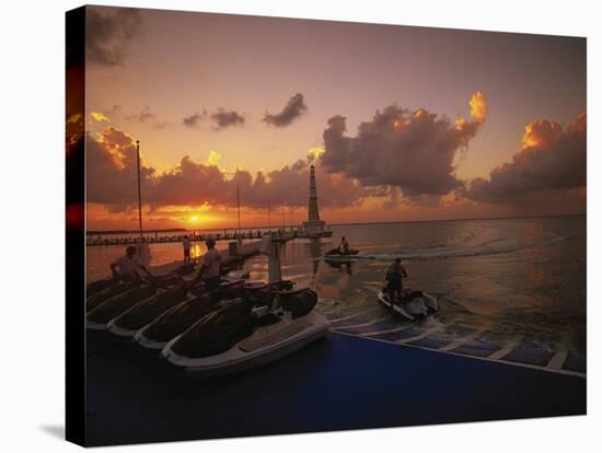 Sunset and Jet Skis, Cancun, Mexico-Walter Bibikow-Stretched Canvas