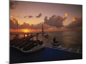 Sunset and Jet Skis, Cancun, Mexico-Walter Bibikow-Mounted Photographic Print