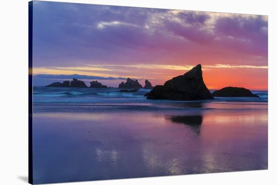 Sunset and sea stacks, Bandon, Oregon-Darrell Gulin-Stretched Canvas