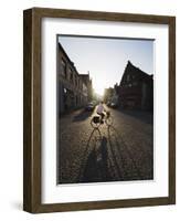 Sunset and Shadow of a Cyclist on Cobbled Street, Old Town, UNESCO World Heritage Site, Bruges-Christian Kober-Framed Photographic Print