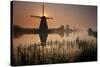 Sunset and Silhouetted Windmills Reflected in the Canals Kinderdijk-Darrell Gulin-Stretched Canvas