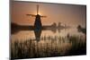 Sunset and Silhouetted Windmills Reflected in the Canals Kinderdijk-Darrell Gulin-Mounted Photographic Print