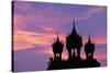 Sunset at Pha That Luang Gate in Laos-null-Stretched Canvas