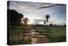 Sunset at the Gate of a Bonito Farm, with Rolling Hills in the Background-Alex Saberi-Stretched Canvas