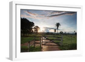 Sunset at the Gate of a Bonito Farm, with Rolling Hills in the Background-Alex Saberi-Framed Photographic Print