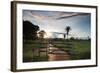 Sunset at the Gate of a Bonito Farm, with Rolling Hills in the Background-Alex Saberi-Framed Photographic Print