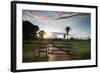 Sunset at the Gate of a Bonito Farm, with Rolling Hills in the Background-Alex Saberi-Framed Photographic Print