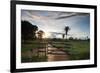 Sunset at the Gate of a Bonito Farm, with Rolling Hills in the Background-Alex Saberi-Framed Photographic Print