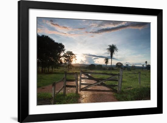 Sunset at the Gate of a Bonito Farm, with Rolling Hills in the Background-Alex Saberi-Framed Photographic Print