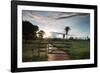 Sunset at the Gate of a Bonito Farm, with Rolling Hills in the Background-Alex Saberi-Framed Photographic Print