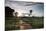 Sunset at the Gate of a Bonito Farm, with Rolling Hills in the Background-Alex Saberi-Mounted Photographic Print