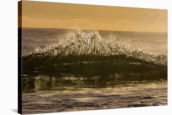 Sunset back lights a tubing wave-Mark A Johnson-Stretched Canvas