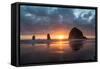 Sunset behind Haystack Rock at Cannon Beach on the Pacific Northwest coast, Oregon, United States o-Martin Child-Framed Stretched Canvas