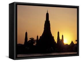 Sunset Behind Temple of Dawn on Chao Phraya River, Thailand-Merrill Images-Framed Stretched Canvas