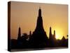 Sunset Behind Temple of Dawn on Chao Phraya River, Thailand-Merrill Images-Stretched Canvas