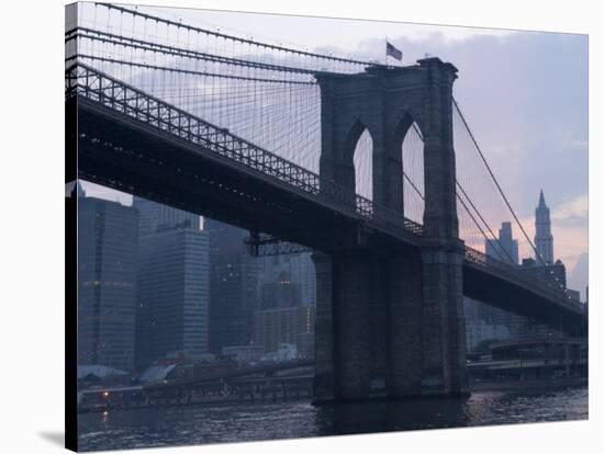 Sunset Behind the Brooklyn Bridge and Manhattan on a Humid Summer Evening-John Nordell-Stretched Canvas