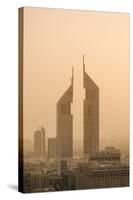 Sunset Engulfs the Jumeirah Emirates Towers Hotel Dubai, Uae-Michael DeFreitas-Stretched Canvas