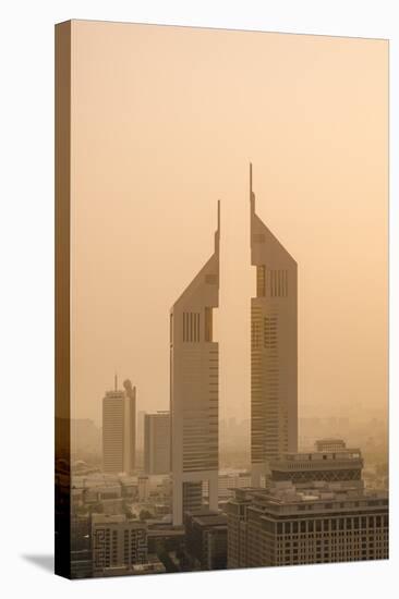 Sunset Engulfs the Jumeirah Emirates Towers Hotel Dubai, Uae-Michael DeFreitas-Stretched Canvas