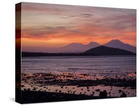 Sunset, looking from Bali to Java, Indonesia, Southeast Asia, Asia-Melissa Kuhnell-Stretched Canvas
