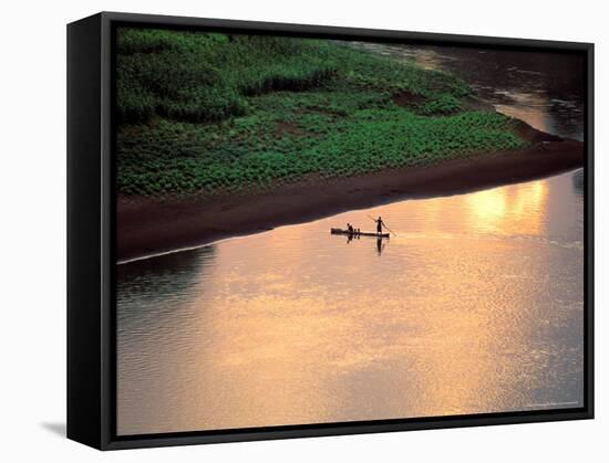 Sunset on Karo Men in a Dugout Raft, Omo River, Ethiopia-Janis Miglavs-Framed Stretched Canvas