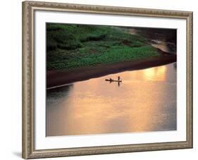 Sunset on Karo Men in a Dugout Raft, Omo River, Ethiopia-Janis Miglavs-Framed Photographic Print