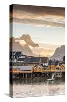 Sunset on the Fishing Village Framed by Rocky Peaks and Sea, Sakrisoya, Nordland County-Roberto Moiola-Stretched Canvas