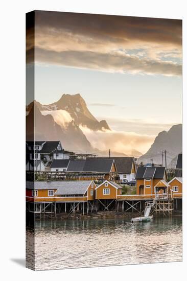 Sunset on the Fishing Village Framed by Rocky Peaks and Sea, Sakrisoya, Nordland County-Roberto Moiola-Stretched Canvas