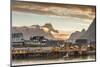 Sunset on the Fishing Village Framed by Rocky Peaks and Sea, Sakrisoya, Nordland County-Roberto Moiola-Mounted Photographic Print