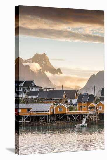 Sunset on the Fishing Village Framed by Rocky Peaks and Sea, Sakrisoya, Nordland County-Roberto Moiola-Stretched Canvas