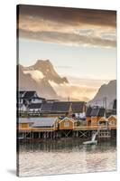 Sunset on the Fishing Village Framed by Rocky Peaks and Sea, Sakrisoya, Nordland County-Roberto Moiola-Stretched Canvas