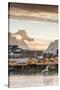 Sunset on the Fishing Village Framed by Rocky Peaks and Sea, Sakrisoya, Nordland County-Roberto Moiola-Stretched Canvas