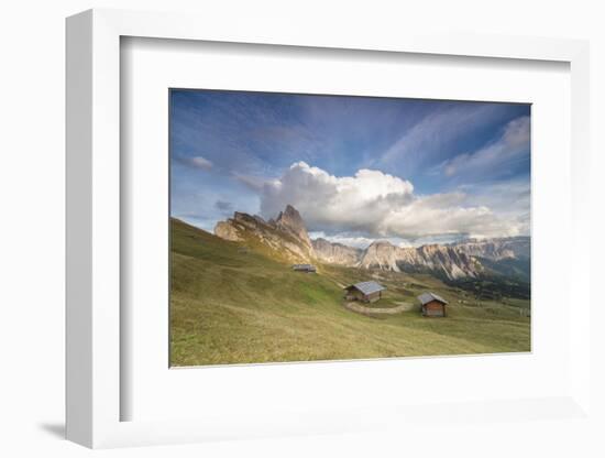 Sunset on the green meadows and huts of the Odle mountain range seen from Seceda, Val Gardena, Tren-Roberto Moiola-Framed Photographic Print
