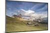 Sunset on the green meadows and huts of the Odle mountain range seen from Seceda, Val Gardena, Tren-Roberto Moiola-Mounted Photographic Print