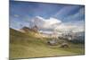 Sunset on the green meadows and huts of the Odle mountain range seen from Seceda, Val Gardena, Tren-Roberto Moiola-Mounted Photographic Print