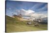 Sunset on the green meadows and huts of the Odle mountain range seen from Seceda, Val Gardena, Tren-Roberto Moiola-Stretched Canvas