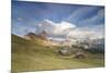 Sunset on the green meadows and huts of the Odle mountain range seen from Seceda, Val Gardena, Tren-Roberto Moiola-Mounted Photographic Print