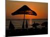 Sunset on Umbrellas, Kusadasi, Turkey-Joe Restuccia III-Mounted Photographic Print