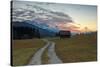 Sunset on wooden huts and meadows with the Alps in background, Geroldsee, Krun, Garmisch Partenkirc-Roberto Moiola-Stretched Canvas