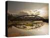 Sunset Over a Bridge in Da Nang with a Small Fisherman's Boat-Alex Saberi-Stretched Canvas