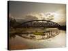 Sunset Over a Bridge in Da Nang with a Small Fisherman's Boat-Alex Saberi-Stretched Canvas