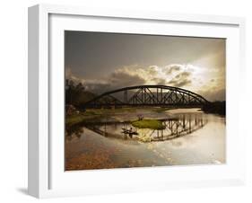 Sunset Over a Bridge in Da Nang with a Small Fisherman's Boat-Alex Saberi-Framed Premium Photographic Print